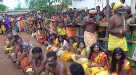 BETTER QUALITY VERSION: This festival's a smash! Hindu devotees have coconuts broken on their heads