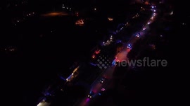 Touching clip shows HUNDREDS of police joining parade to make boy with terminal cancer's final wish come true