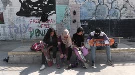 Palestinian girls practice on Skateboard sport at Gaza seaport