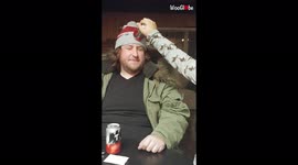 'Watching a beer can being smashed on her friend's head sends filmer into a laughing frenzy 
'