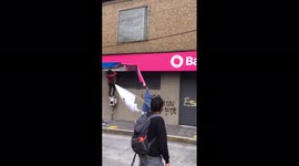 Ecuador: Paro Nacional Protests – Protesters Rip Bank Signage In Quito