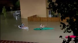 Italians turn to kayaks to navigate streets after 'Medicane' deadly flooding rocks Catania