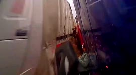 Motorist survives after being crushed in between colliding trucks in eastern China