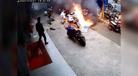 Lithium battery bursts into flames after customer removes it from scooter in China