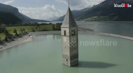 This steeple rising from an Italian lake is STUNNING