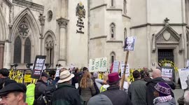 Supporters of Julian Assange wait outside London court as extradition hearing continues