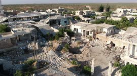 Drone footage shows a destroyed town in Idlib, Syria