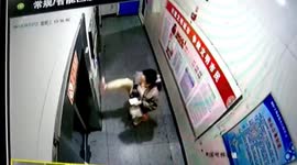 Woman uses her foot to press elevator buttons in China