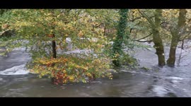 River Rothay in Cumbria in UK bursts its banks after heavy rainfall