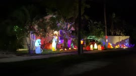 A haunted house on the street can't decide whether it's Halloween or Christmas