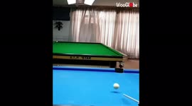 Iranian pool shark nails remarkable two-table trick shot