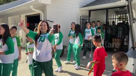 Family of 70 wear Squid Game outfits for EPIC Halloween party in Texas