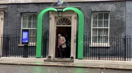 UK PM Boris Johnson buys a poppy outside 10 Downing Street