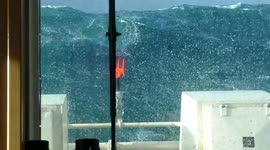 Crewman aboard a UK rescue ship films terrifying encounter with colossal 22-metre waves