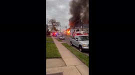 Massive fire at former auto dealership in New Jersey