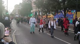 Hundreds of Halloween revellers rollerblade through streets of London