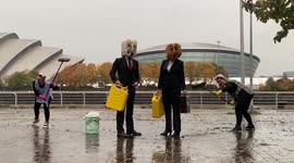 Climate Activists Stage Dirty Oil Protest Outside Cop26 Venue in Glasgow Ahead of UN Climate Change Conference