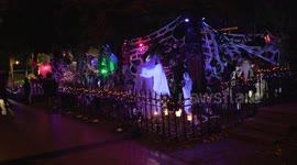 Homeowner in Toronto go all out with their Halloween decorations, attracting crowds of spectators