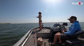 Man proposes to girlfriend as she reels in fish during boat trip in Texas