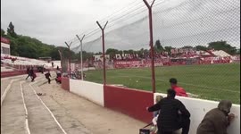 Fans take cover after head coach shot during football game in Argentina