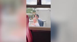 Hilarious moment dad keeps pace with moving train as daughter departs