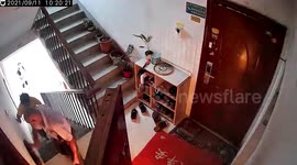 Chinese resident risks life to drag flaming gas cylinder out of building