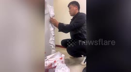 Dad covers wall corners in nappies so his daughter stops banging her head