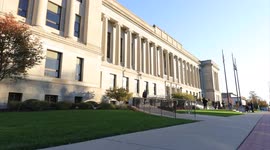 Morning Timelapse of courthouse in kenosha Wisconsin on Tuesday as people are arriving and the media is setting up