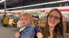 Toddler girl hates the mannequin, she screams at it and hits it.