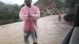 Highway flooded after heavy rain in western Thailand