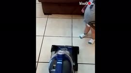 ''Monkey see, monkey do' - Cute toddler 'helps' mom with vacuuming the floor 
'