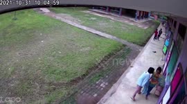 Shocked Thai students flee from building during earthquake