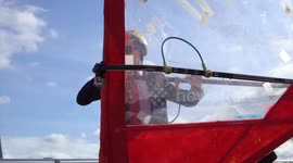 Commuter windsurfed his way around London in protest at the cost of the new ULEZ car tax