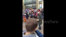 Climate activists hold protest march against ‘greenwashing’ in Glasgow, UK