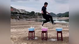Chinese man walks on water in incredible demonstration of balance
