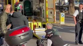 Biker Crashes on Car Attempting U-Turn