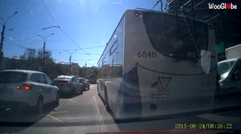 'Cyclist BARELY AVOIDS horrendous crash after falling off bike while riding on tram tracks '