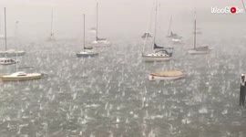 'Massive hailstones hitting the sea with FULL FORCE'
