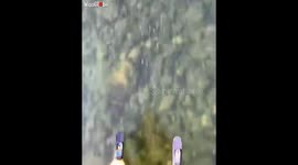 'Thrill seeker skis across crystal-clear, frozen Sebago Lake (Maine)
'