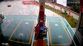Car drifts across petrol station forecourt and hits pump in China