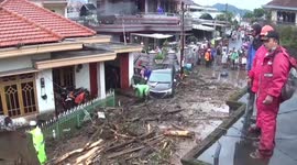 Indonesian city is battered by flash floods and heavy rain