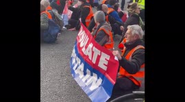 Insulate Britain protesters glue hands to block roads near Parliament