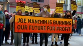 Climate activists protest against West Virginia senator Joe Manchin