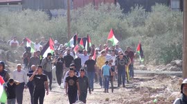 Palestinian protesters clash with Israeli forces following a demonstration against the establishment of Israeli outposts on Palestinian lands