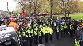 Front of protest holding banners and chanting at COP26 Protests at Glasgow 2021 United Kingdom moving along road