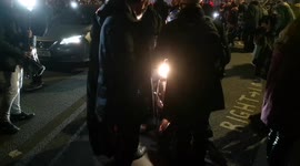 Million Mask March Protestors Deliberately Block A Motorcyclist From Getting Down The Road In Whitehall