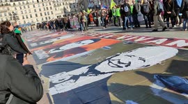 Protesters march in Paris to mark 'Global Day for Climatic Justice'