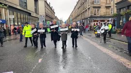 Protesters arrest fake world leaders and chain them during protest in Glasgow