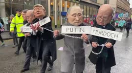 Activists arrest and chain fake world leaders during climate protest in Glasgow