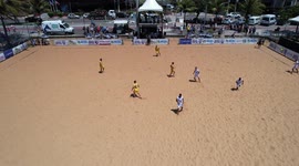 Beach soccer is a type of soccer played in the sand. They are playing at Praia da Costa beach in Vila Velha - ES - BRAZIL